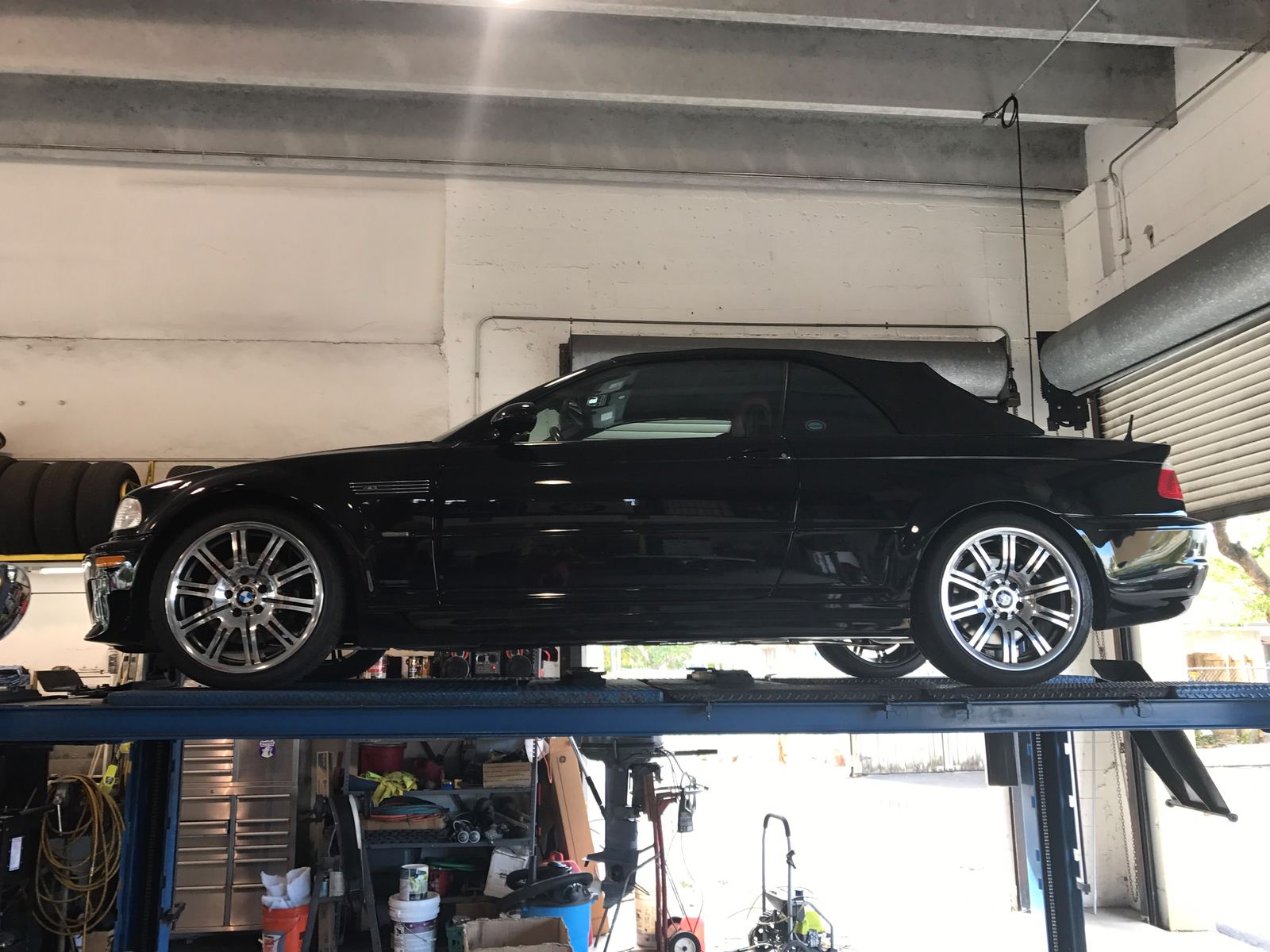 BMW M3 convertible on a lift at Auto Star Co. in Hallandale Beach