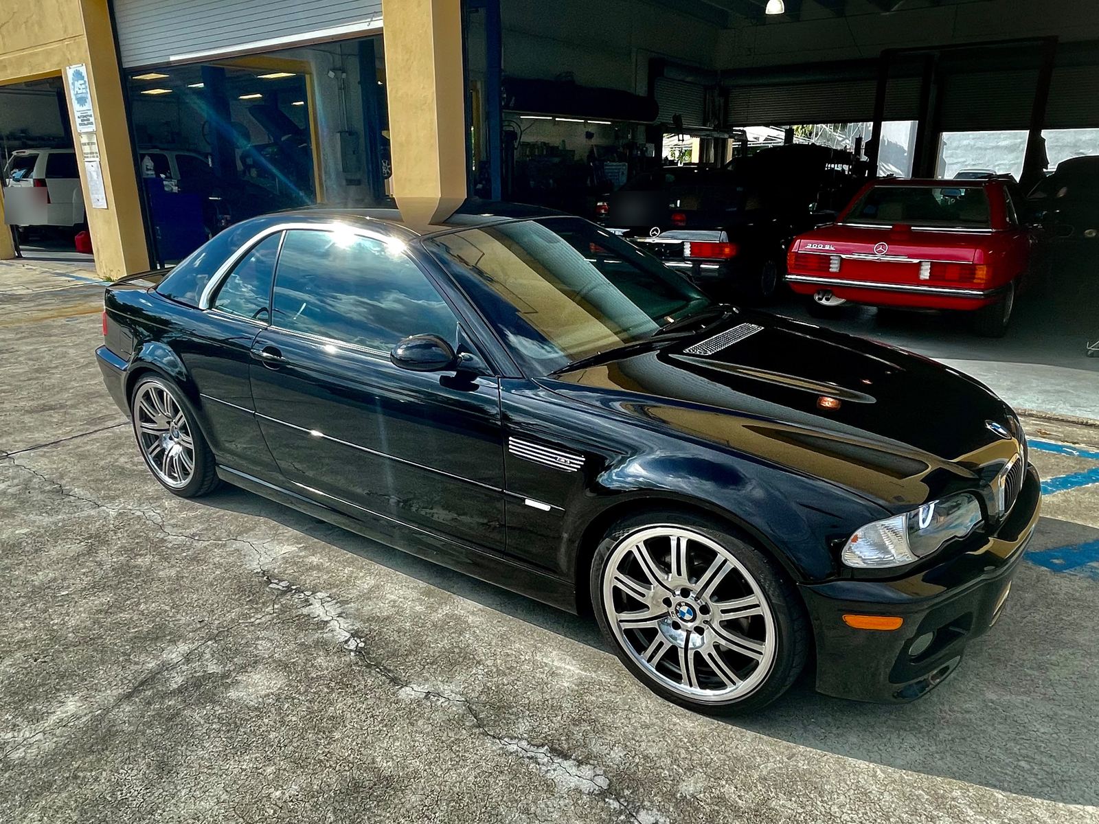 Black BMW M3 convertible outside the bays at Auto Star Co. in Hallandale Beach