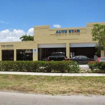 Auto Star Co. storefront with Tire Center sign on S Dixie Hwy